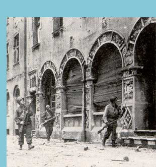 The 35th Division doughs search for snipers in Herne, Germany